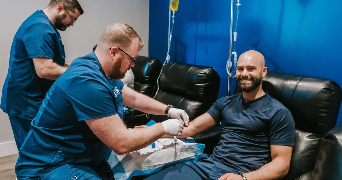 Client relaxing during an IV vitamin drip at iCRYO Highland Village, TX